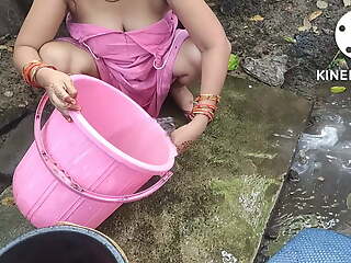 Indian house wife bathing extensively