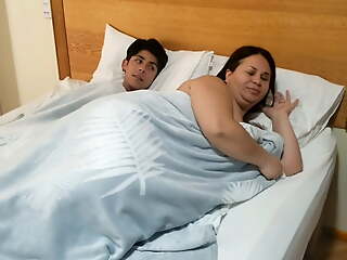 Stepmom sharing bed with stepson