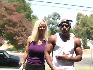 blond glasses lady picked up by black rambo