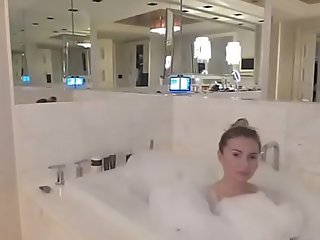 Sexy teen girl having fun in her bathroom
